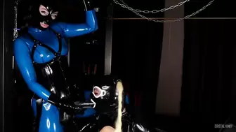 Cristal Kinky in blue latex catsuit playing with my latex sissy bimbo doll