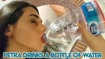 Petra drinks a bottle of water - Full HD