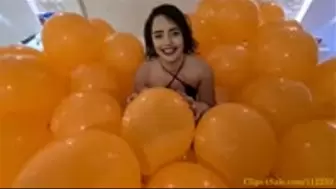 Thay Flores Nail Popping a Huge Balloon Column
