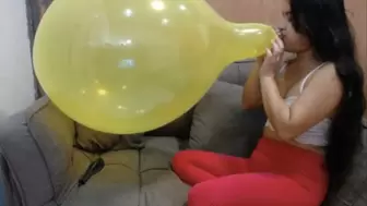 Freya Blows To Pop Your 18 Inch Yellow Balloon