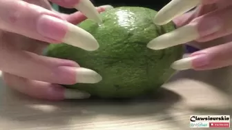Clawing avocado with nails