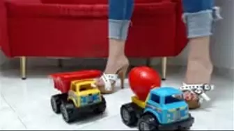 crushing a toy car in wooden sandals and Heels