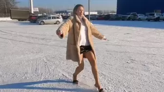 Sexy Emily on two pairs very high heel mules on very slippery ice