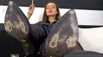 Lick the boot soles and smell her nylon feet!