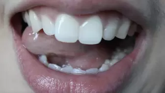 Aurora Licks Her Beautiful Teeth
