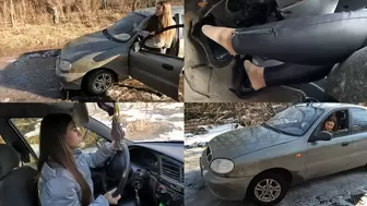 Nicki struggles on a slippery road and gets stuck