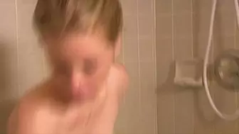 Firm teen takes a shower