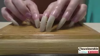 Nails scratching wood