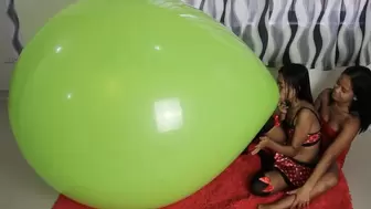 Stella teaches Camylle How To Blow To Pop A GIANT GREEN BALLOON