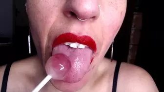 sucking & licking on a lollipop while talking you through hotness