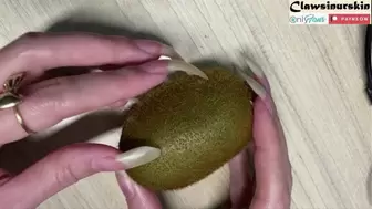 Nails scratching and piercing kiwi