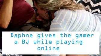 Daphne gives the gamer a BJ while he is playing online