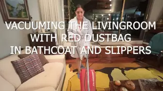 VACUUMING THE LIVING ROOM WITH RED DUSTBAG IN BATHCOAT AND SLIPPERS