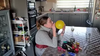 Sophie blows balloons (accidental pops)