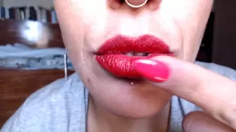 smearing my lipstick around my lips