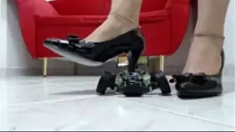crushing a RC toycar with my stiletto heels in barefeet very hard