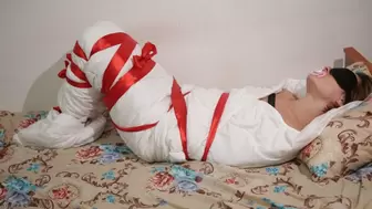 Sofi_ Mummification with a white blanket with a pacifier_ Part 2