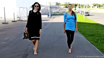 Anastasia and Kristina with huge feet barefoot on an asphalt field (Part 1 of 4) #20220420