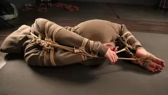 Sofi in overalls tied with jute ropes_ Hogtie_ Part 2