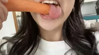 Aurora's Mouth Chews A Big Carrot
