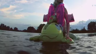 Alla hotly fucks an inflatable dragon on the lake and wears an inflatable vest and armbands for safety!!!