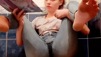 Sexy Helena reads a magazine and pee in jeans