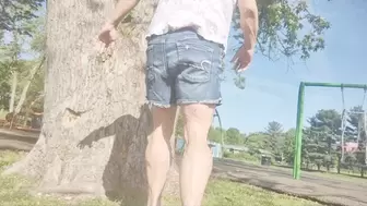 Tempest flexing in white wedges at the park