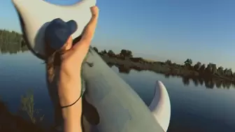 Alla blows away a large rare inflatable whale on the shore of the lake!!!