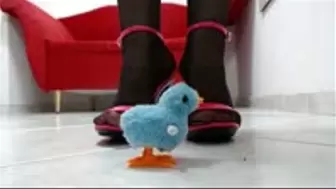 crushing a bird (toy) with sexy highheels sandals in many pieces!!