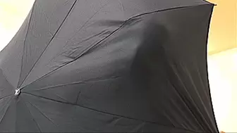 against an umbrella