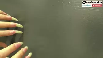 nails leave scratches on a metal door
