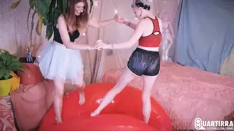 Q765 Cosette and Stashia jump on a huge inflatable tube and deflate it - 480p
