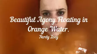 Beautiful Agony Floating in Orange Water