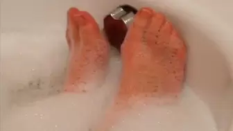 after a long day of work with high heels dasha kelly is having a relaxing bath with bubbles and play with her feet