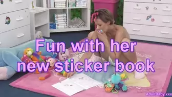 Fun with her new sticker book