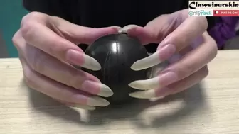 nails scratching the ball - let's check what's inside