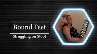Evangelines Bound feet on a stool