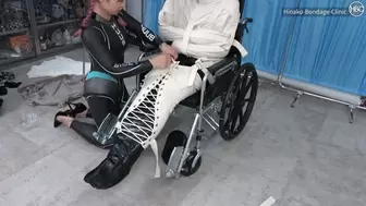 Rubber and Straitjacket Wheelchair Bondage