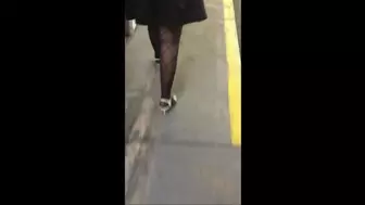 Deb Returning From Las Vegas Wearing Her Black Mini Skirt, Textured Pantyhose, Garter & White Sandals
