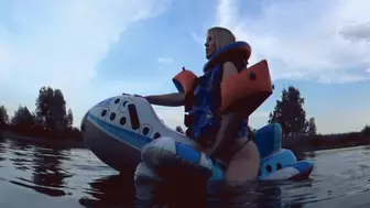 Alla hotly fucks a big inflatable plane floating on it on the lake and wears an inflatable Snorke Pro vest!!!