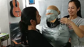 Laura, Katherine & Maria in: Katherine Martinez Collared And Pantyhose Hooded In Multilayered Mummification Bondage (high res mp4)