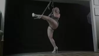 Brutally tied to the ceiling in a Slutty mini dress, struggling to balance in crazy heels, with multiple bound orgasms