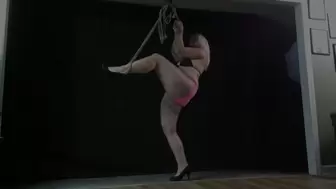 Brutally tied to the ceiling in a Skimpy Bikini, struggling to balance in heels