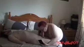 Blowjob on footballer stuck in self bondage on bed