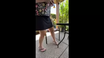 Deb Teasing on the Back Patio as She Dangles Her Black Nanette LePore Danni Spiked Heel Sandals Which She Sinks Into the Grass