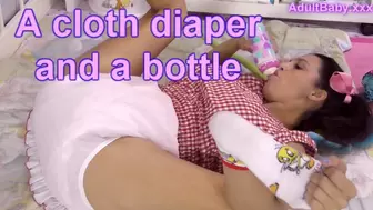A cloth diaper and a bottle