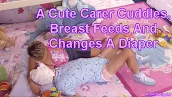 A Cute Carer Cuddles, Breast Feeds And Changes A Diaper
