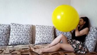 Darina inflates the balloon until it bursts!