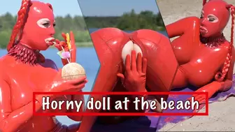 Horny doll at the beach