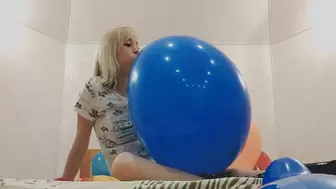Alla inflates five balloons of different colors by 16 inches with her mouth!!!